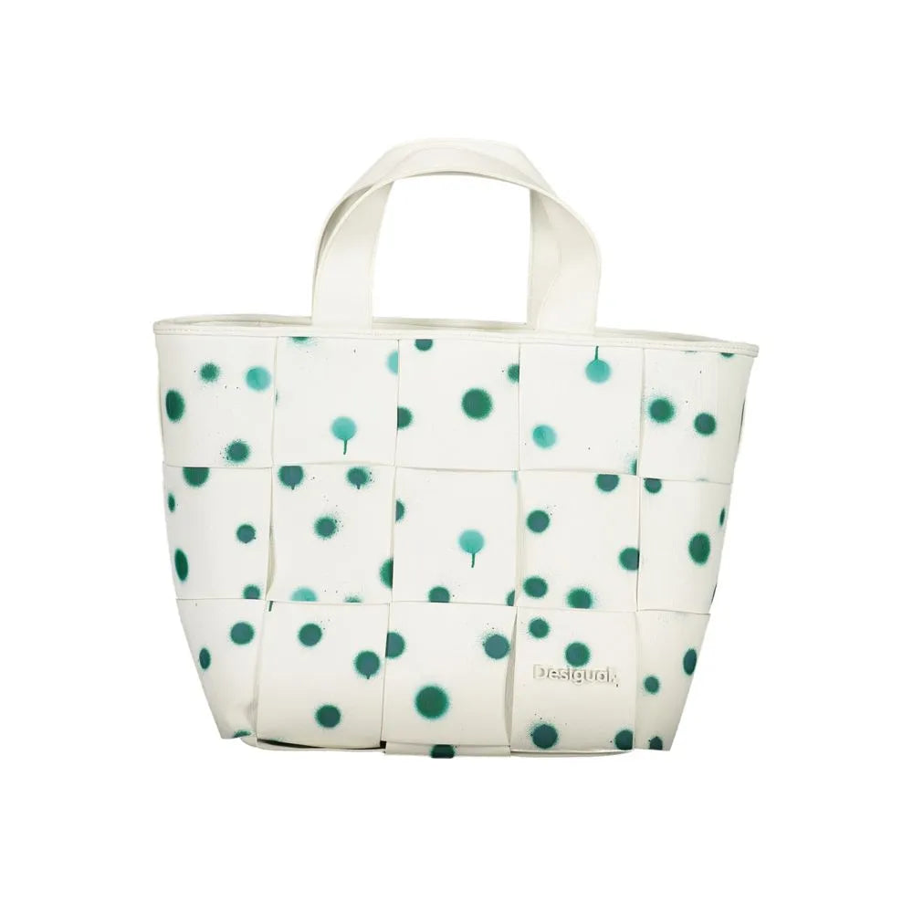 White Desigual poliuretano handbag featuring a woven design with green spray paint dots and two top handles.