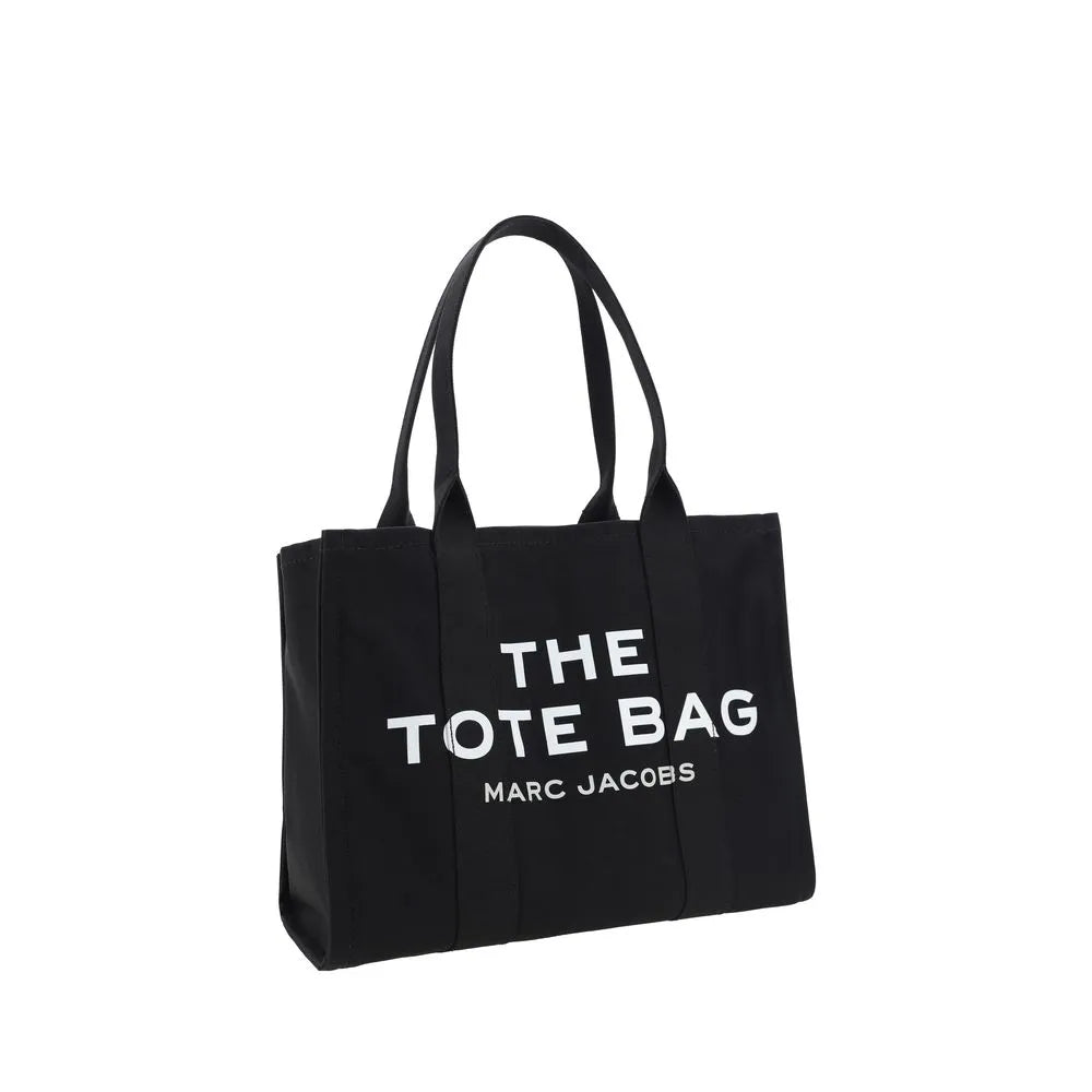 Black cotton Marc Jacobs tote bag with white "THE TOTE BAG" logo and two rigid top handles.