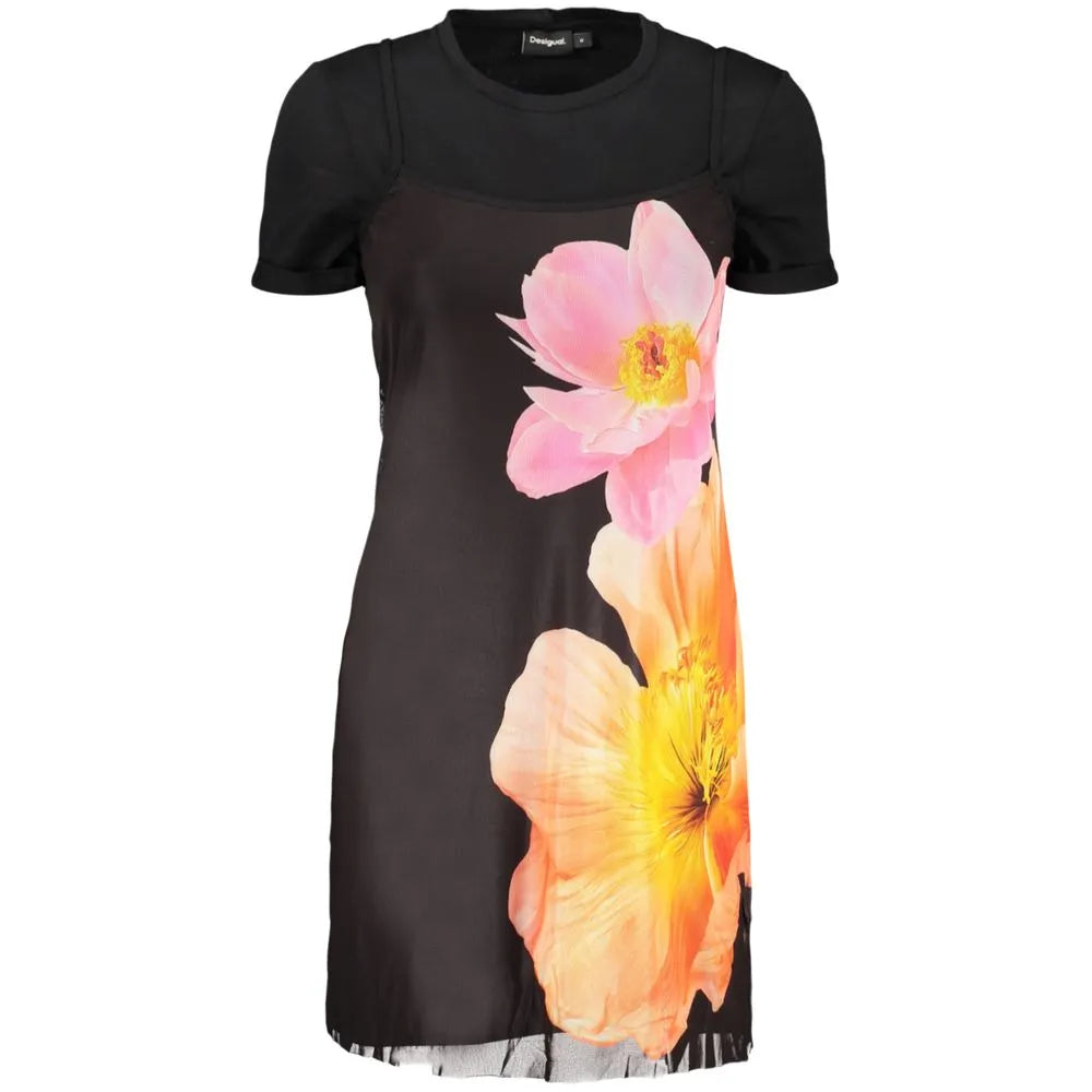 Black cotton women's dress featuring a layered short-sleeve top and vibrant pink and orange floral prints.