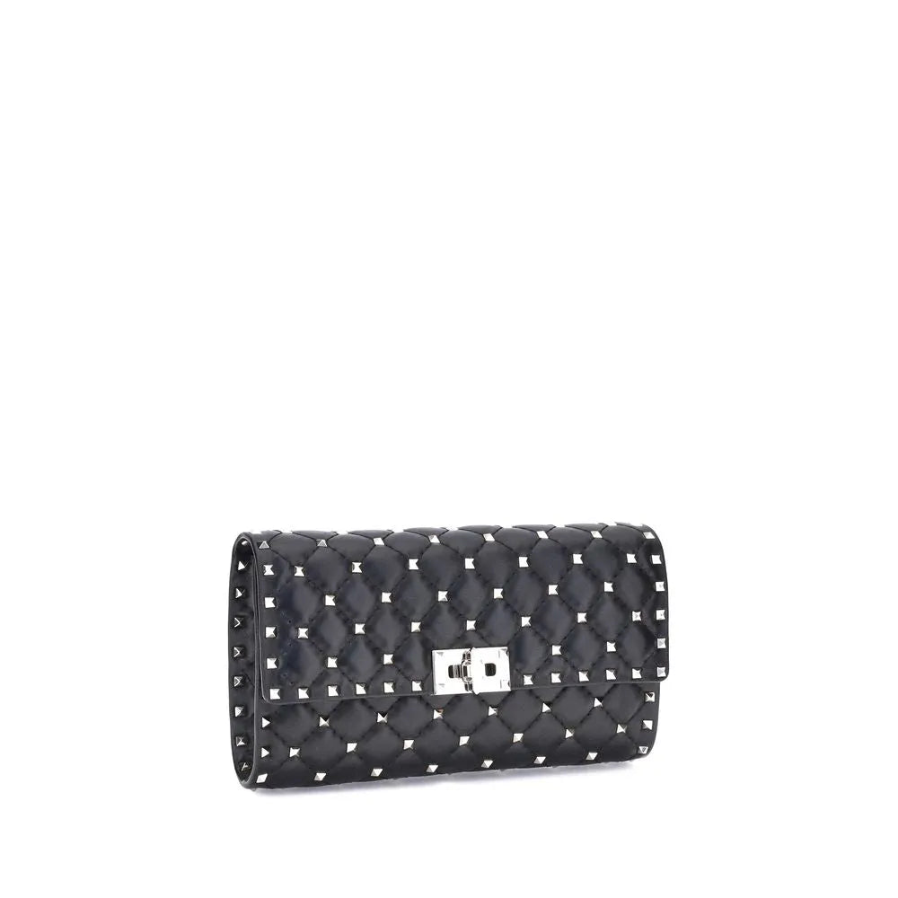 Black lambskin Valentino Garavani Rockstud Spike quilted shoulder bag with silver studs and turnlock closure.