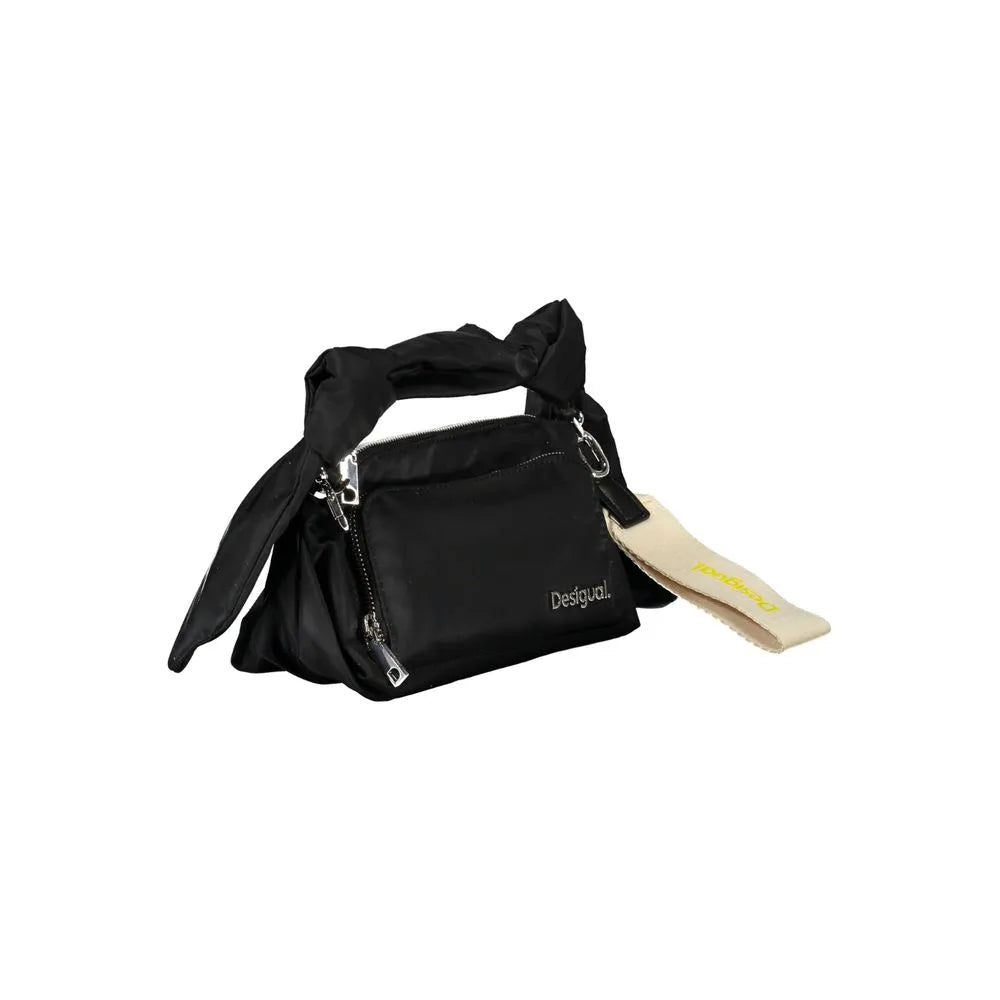 Black Desigual polyester women's handbag with knotted handle, front logo, zip closure, and hanging tag.