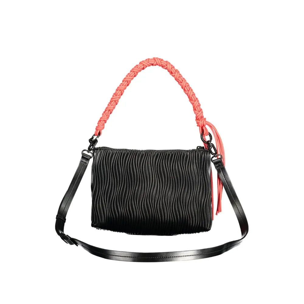 Black wavy textured polyethylene handbag featuring a bright coral braided handle, matching tassels, and an adjustable black strap.