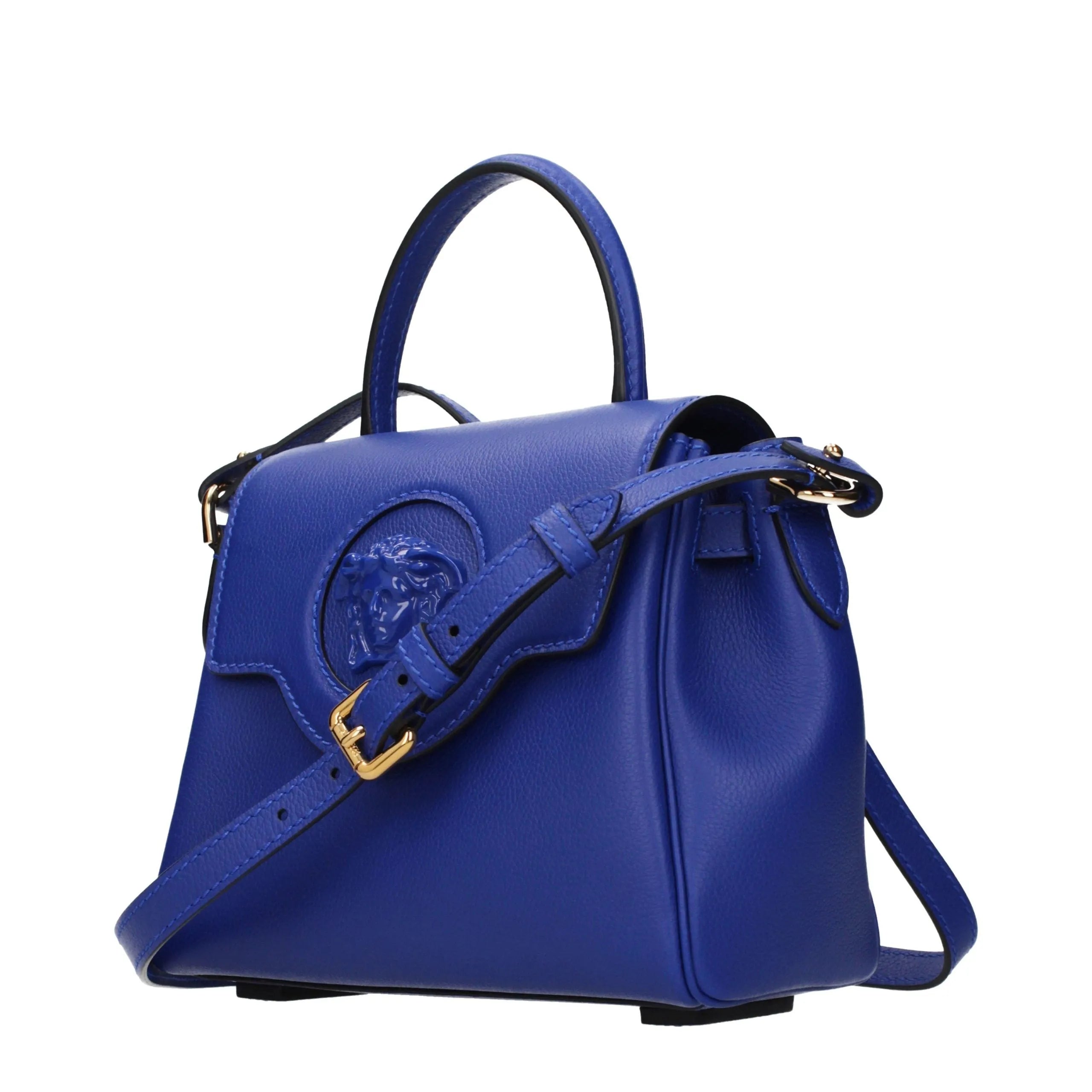 Vibrant blue leather Versace handbag with embossed Medusa head on flap, top handle, and gold-buckled adjustable shoulder strap.