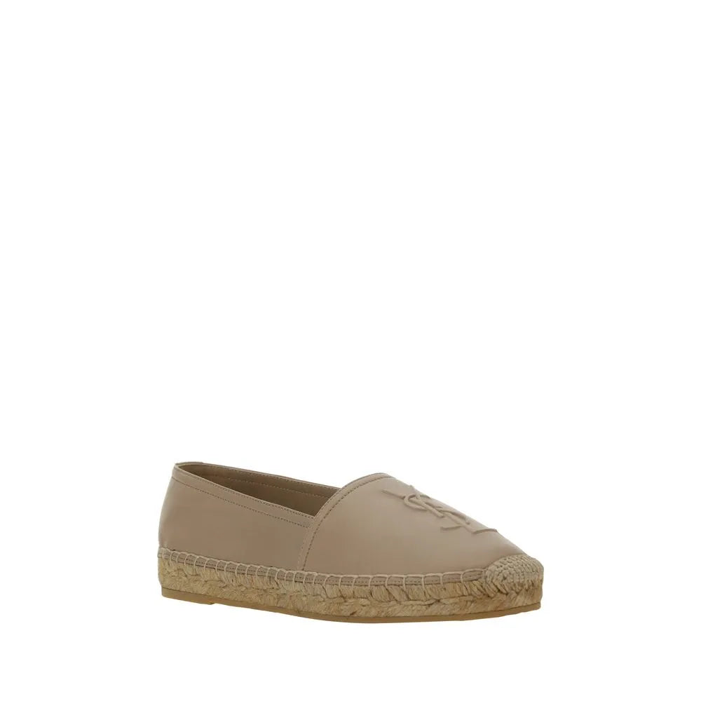 Light brown lambskin slip-on espadrille with YSL monogram, rope sole, and elongated toe.