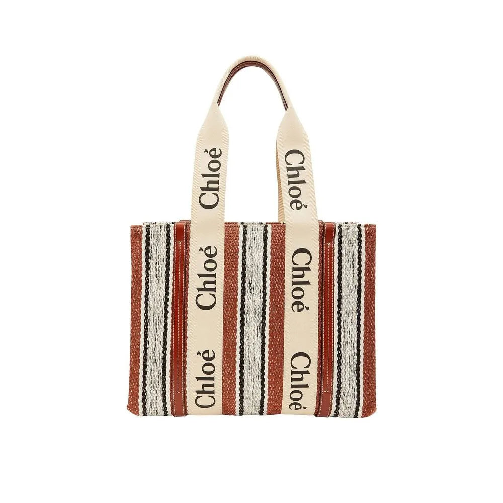 Brown and cream striped linen tote bag with Chloé logo ribbon handles and dark brown leather accents.