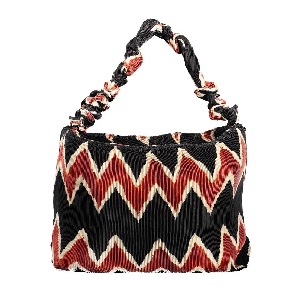 Desigual black pleated shoulder bag with bold red, cream, and black zigzag pattern and ruched strap.