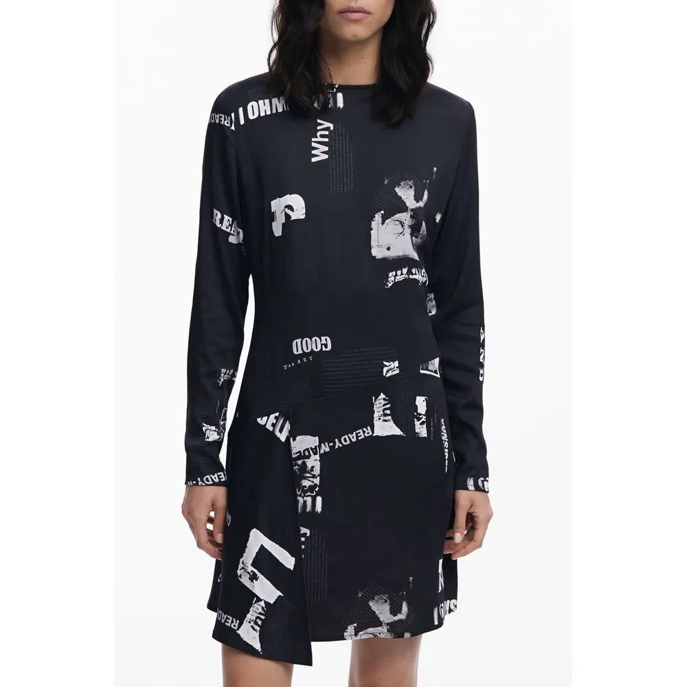 Black Viscosa Desigual women's short dress with bold white text print, long sleeves, and a modern design.