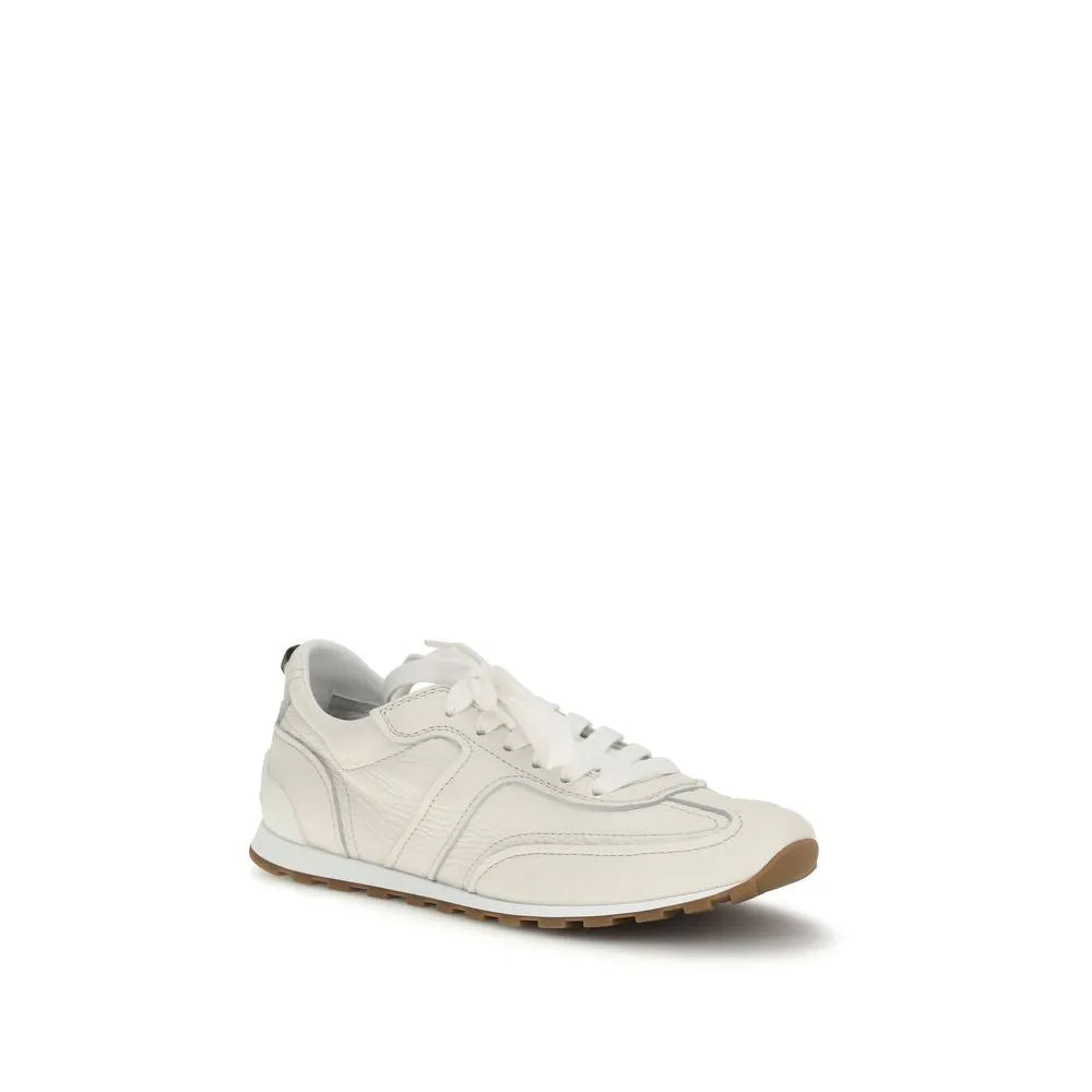 White calf leather low-top sneakers with lace-up fastening, pull tab, and brown rubber sole.