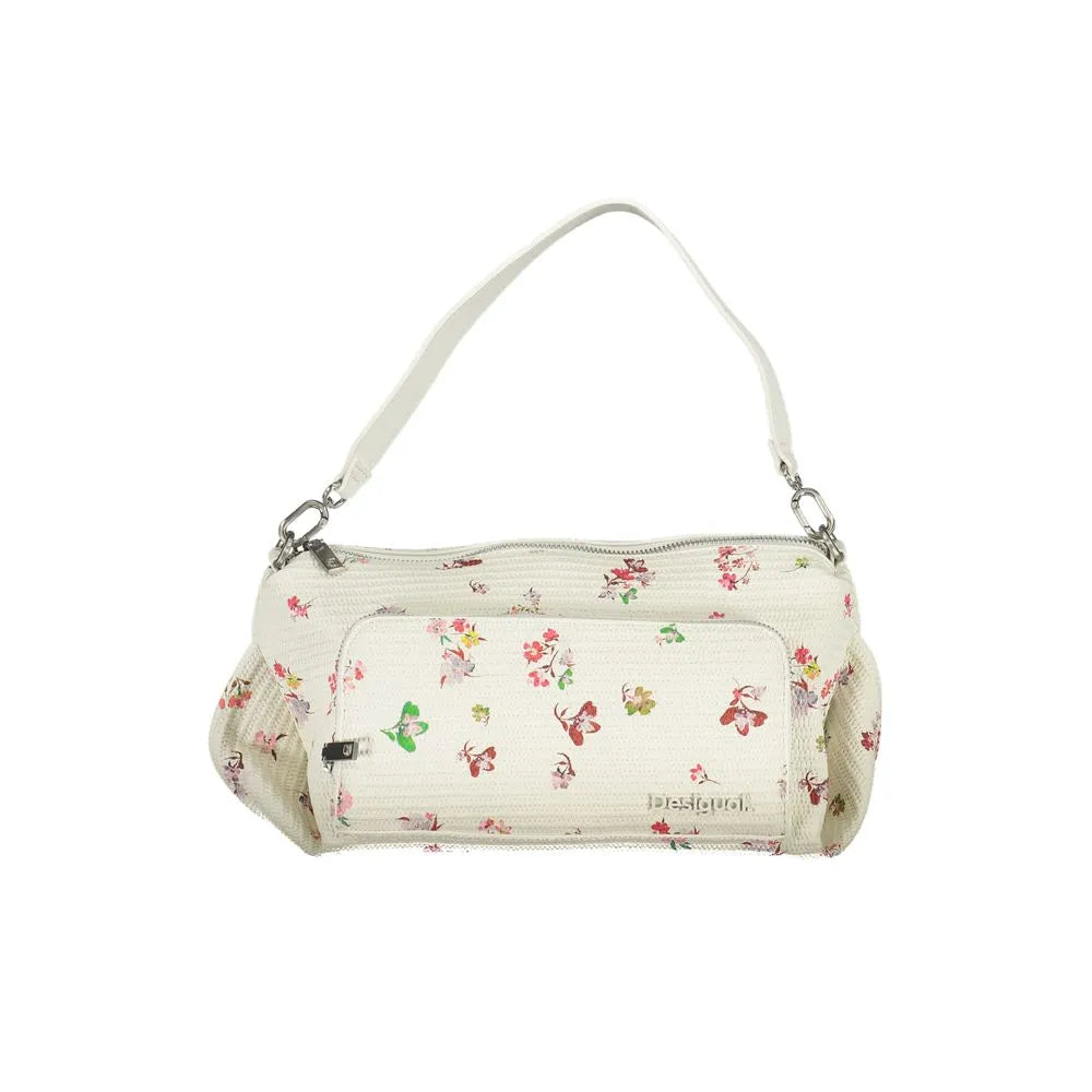 White polyurethane Desigual shoulder bag with colorful floral and butterfly print, front pocket, and zip closure.