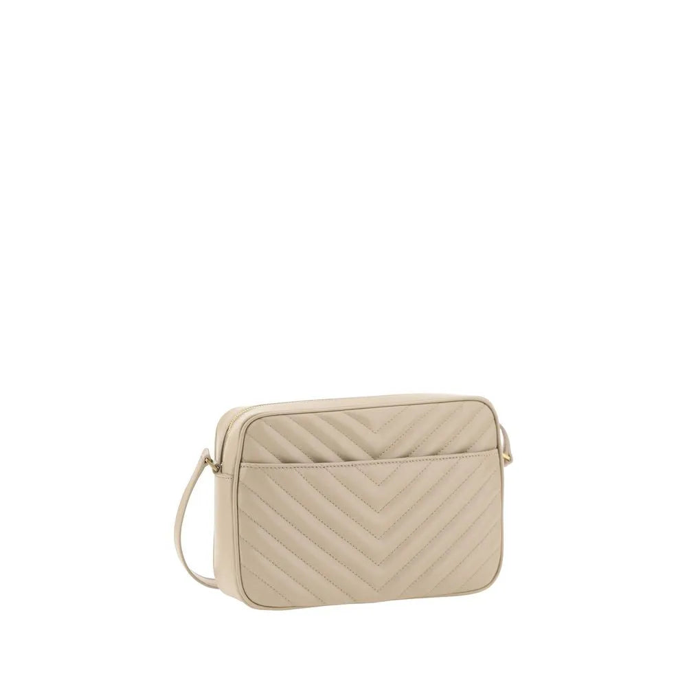 Beige calf leather shoulder bag with chevron quilting, top zip closure, and front slit pocket.