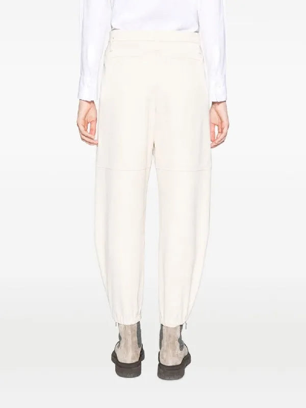 Brunello Cucinelli women's soy cotton relaxed-fit pants with ankle zippers, back view.