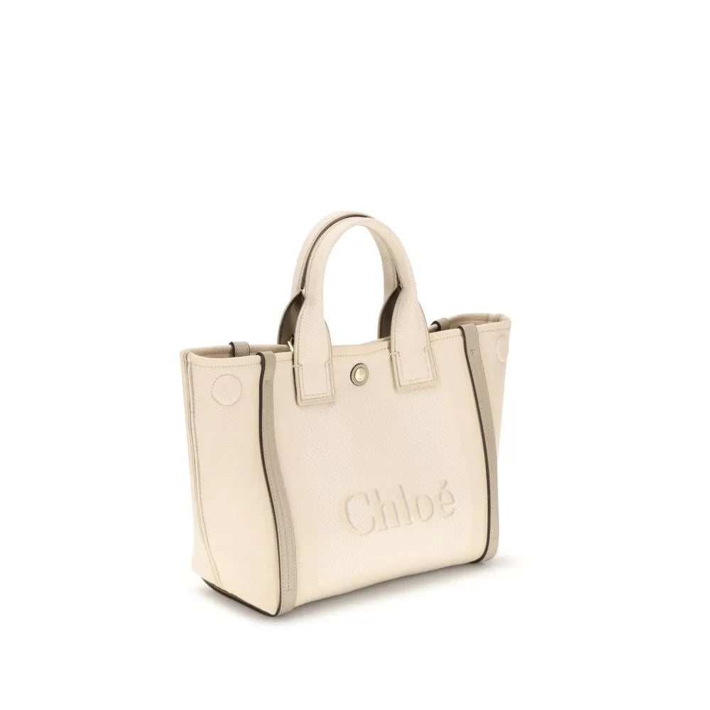 Beige Chloé cotton tote handbag with embossed logo, double top handles, and grey leather side trim.