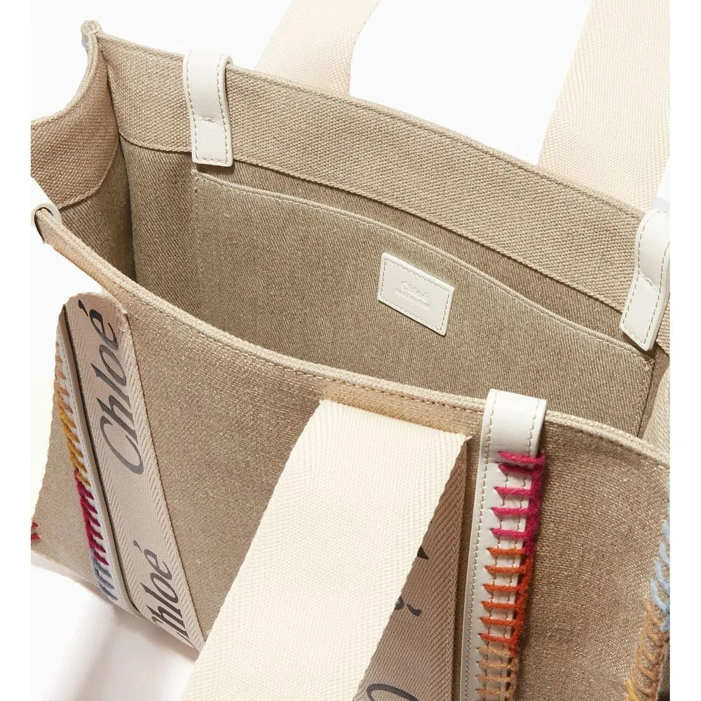 Beige recycled wool tote bag with multi-coloured blanket-stitched trims, Chloé logo ribbon, and interior slip pocket.