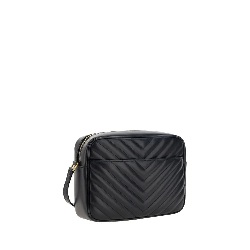 Black calf leather quilted shoulder bag with chevron pattern and gold-tone top zip.