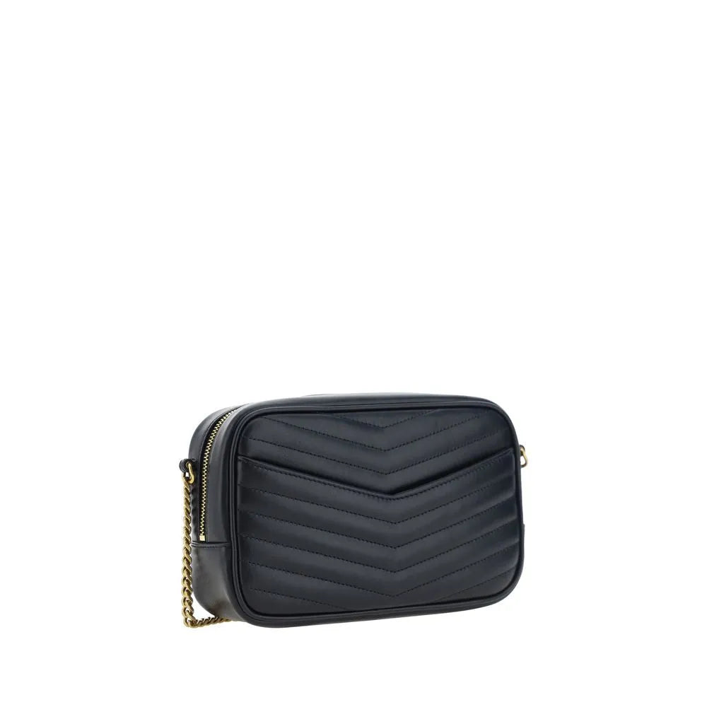 Black calf leather shoulder bag with chevron quilting, a gold-tone chain, and top zipper.