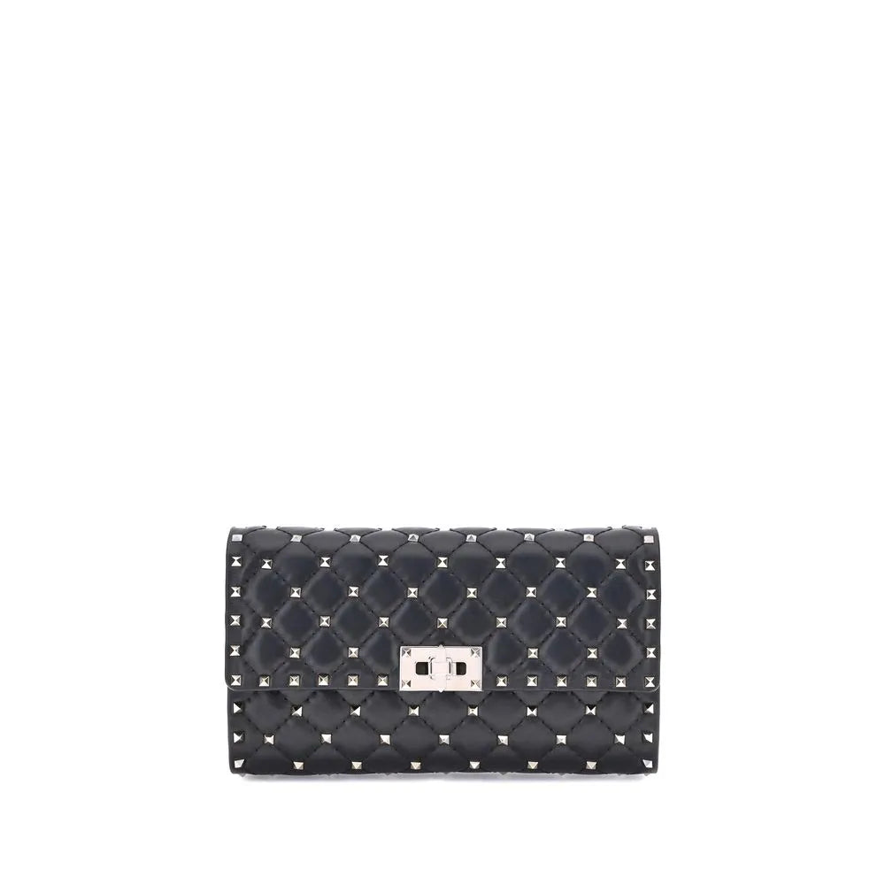 Black quilted lambskin Valentino Garavani Rockstud Spike shoulder bag with silver studs and turnlock.