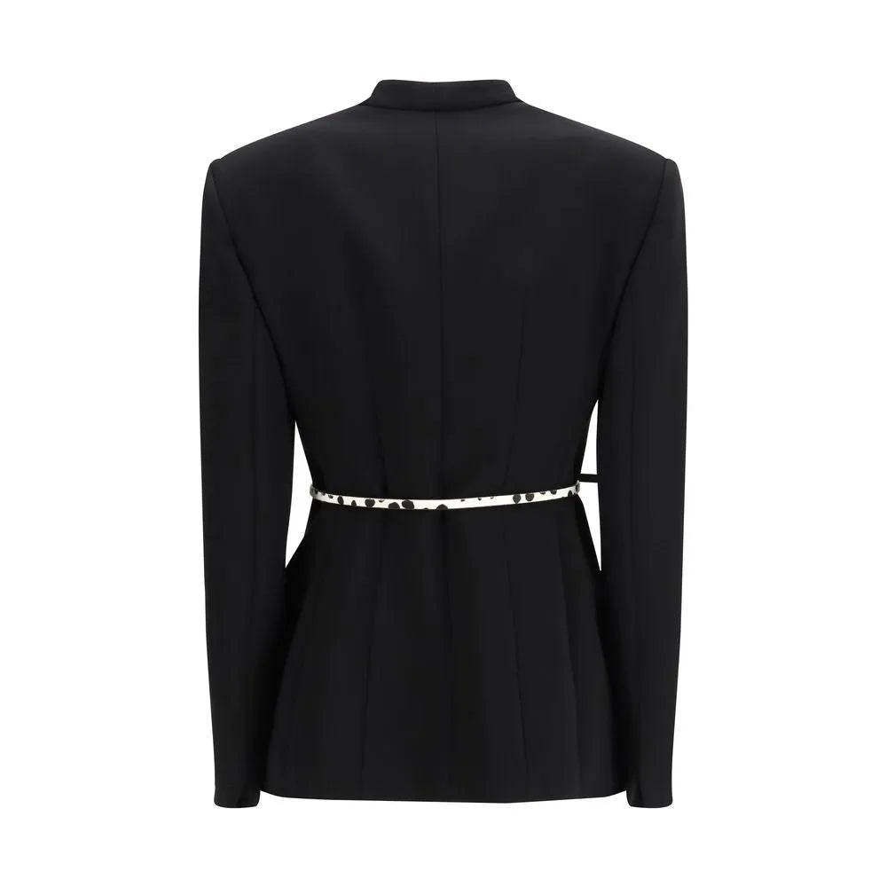 Black triacetate cady jacket, back view, with a slim white belt featuring black spots, cinched waist.