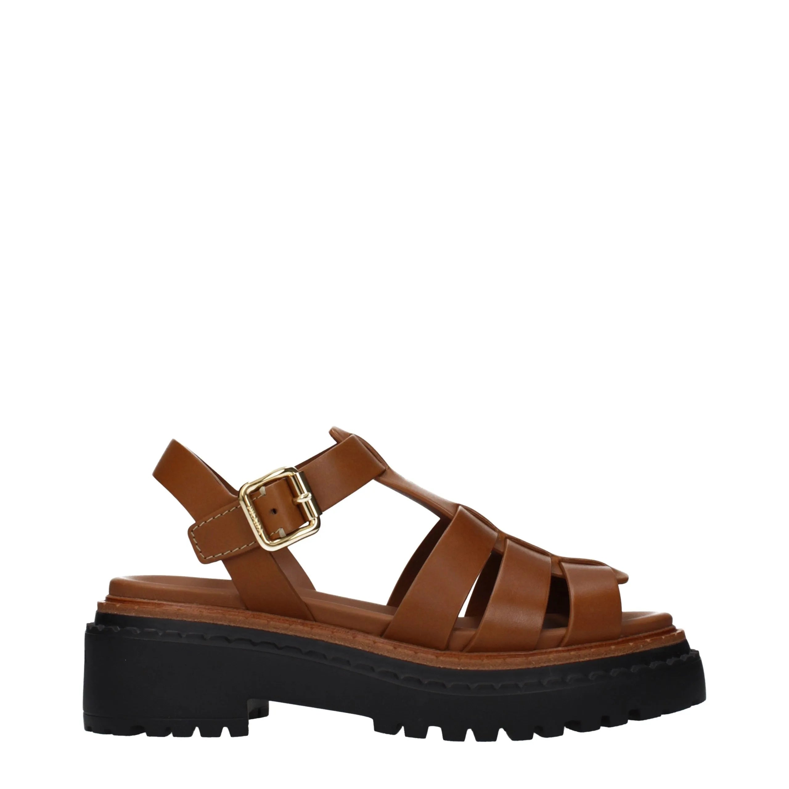 Brown leather platform sandals with caged straps, gold buckle, and chunky black lug sole.