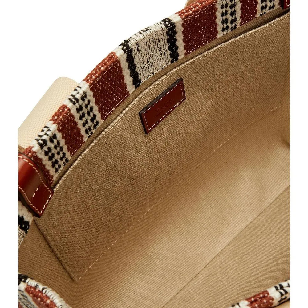 Brown linen tote bag with woven brown, white, black pattern, leather trim, and beige cotton canvas lining with Chloé logo tag.