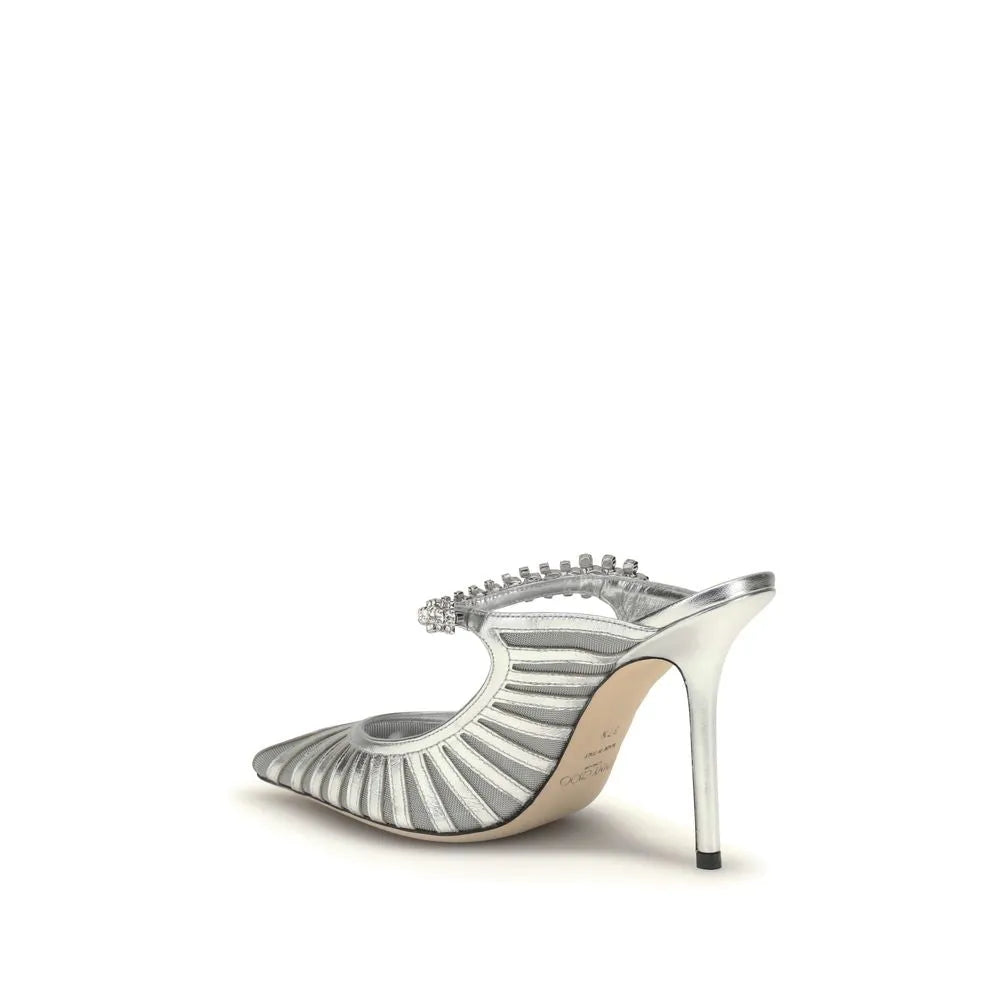 Silver metallic weave leather high heel pump by Jimmy Choo with pointed toe and crystal strap.