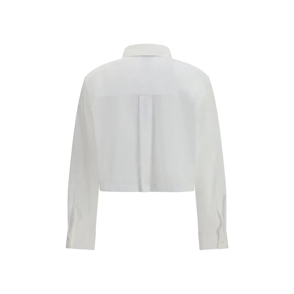 White cotton poplin cropped shirt, back view. Long sleeves with buttoned cuffs and a classic collar.