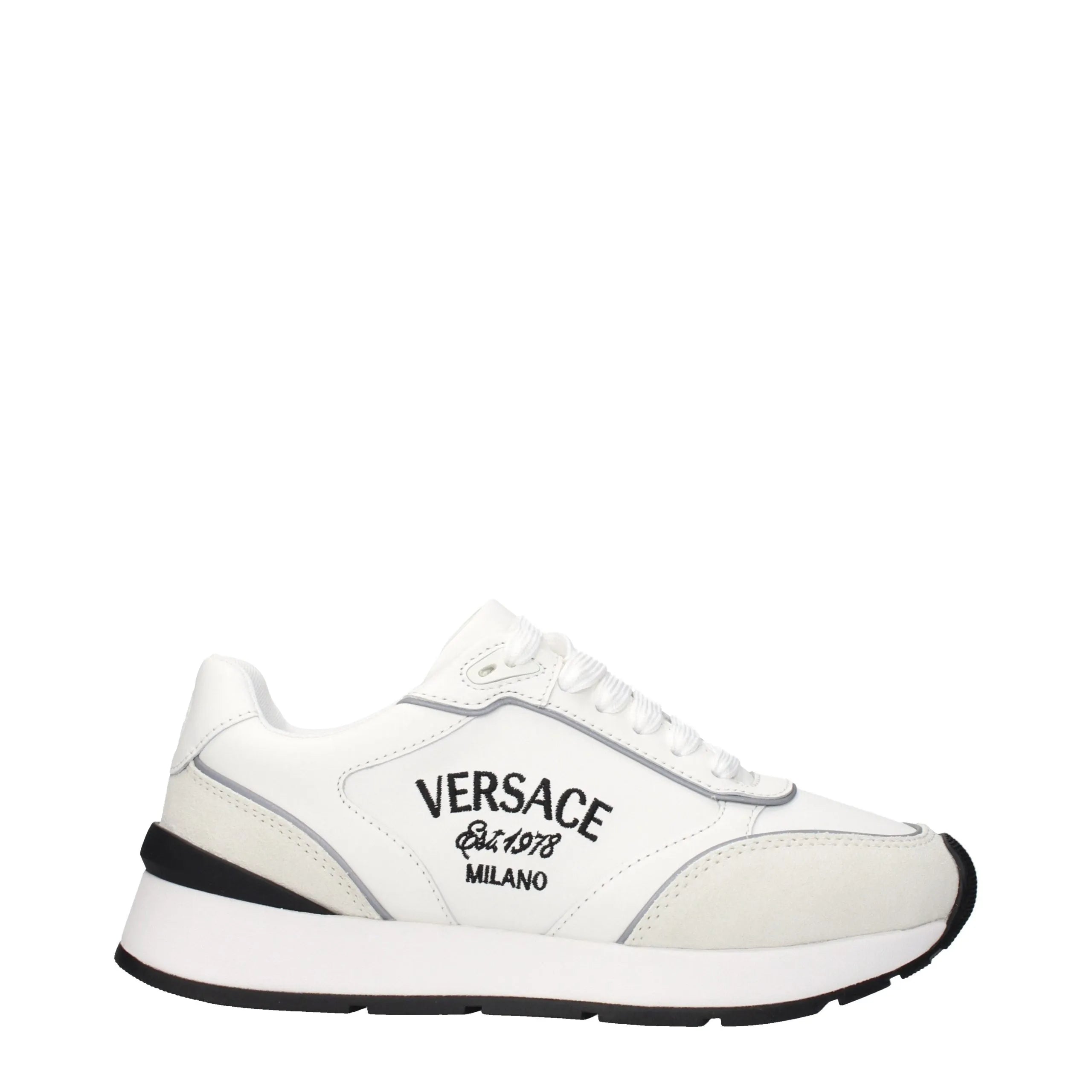 White leather and suede Versace low-top sneaker with black 'VERSACE Est. 1978 MILANO' side logo and black sole.